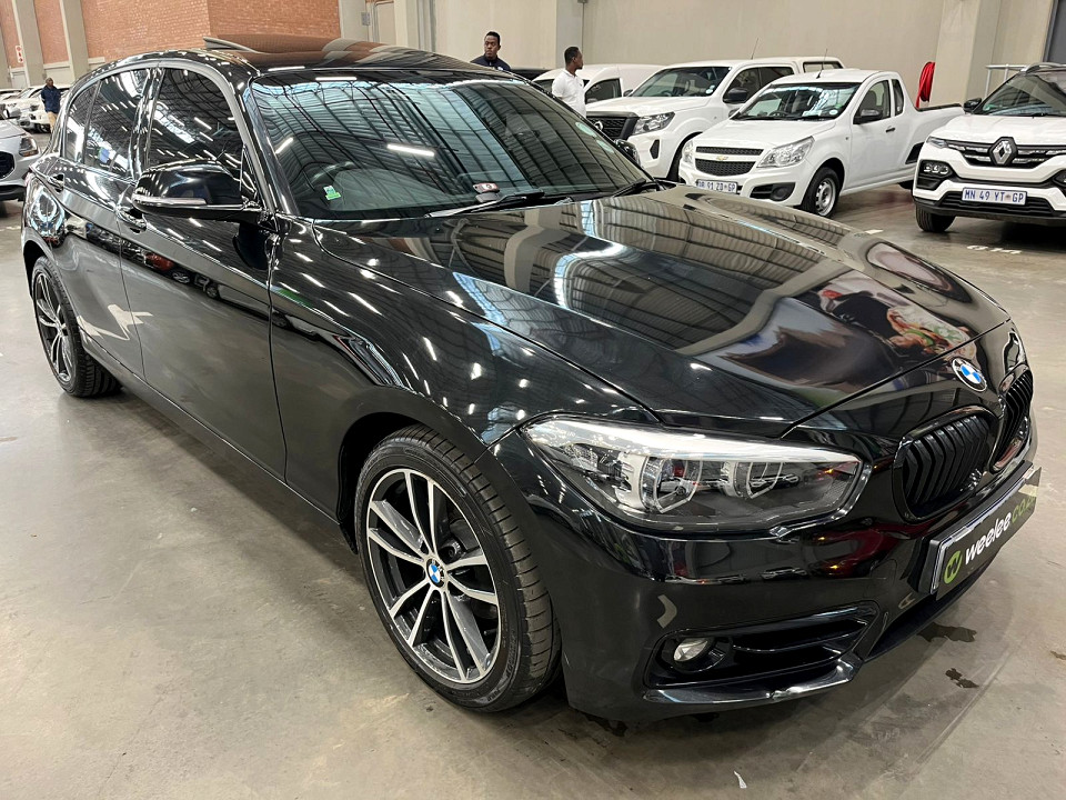 BMW 118i 5-door Urban auto, image 1